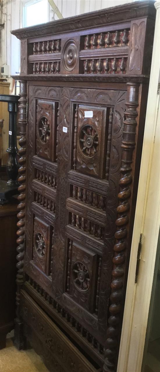 Carved oak cupboard